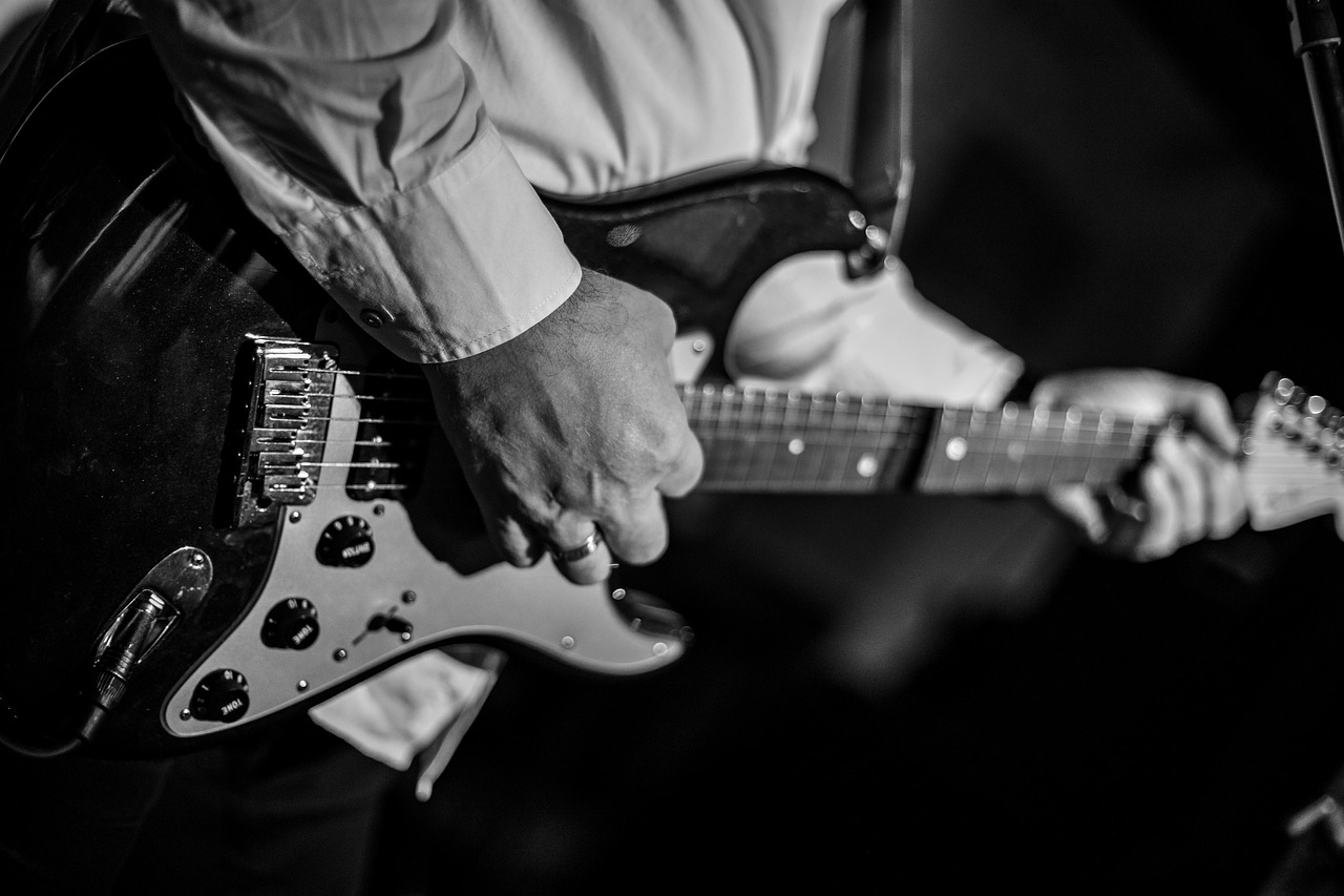 Guitarist playing an easy rock song on electric guitar